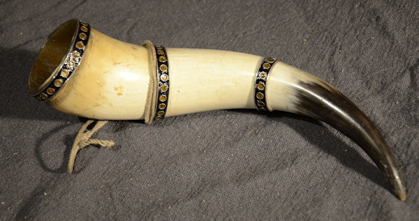 Drinking horn with silver decoration